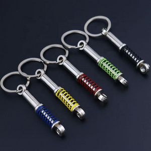 Wholesale custom Metal car Shock absorber shape keychain Auto car parts keychain