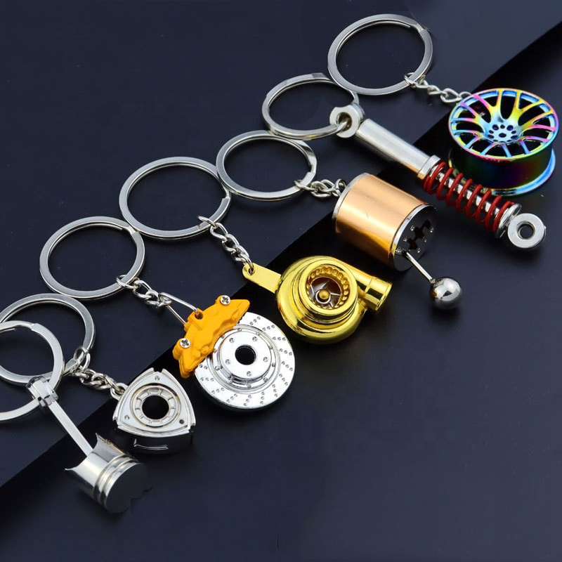 Wholesale custom Metal car Shock absorber shape keychain Auto car parts keychain