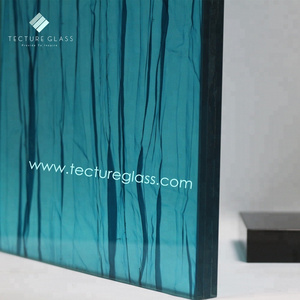 Tecture low iron laminated glass with blue textile between two glass panels