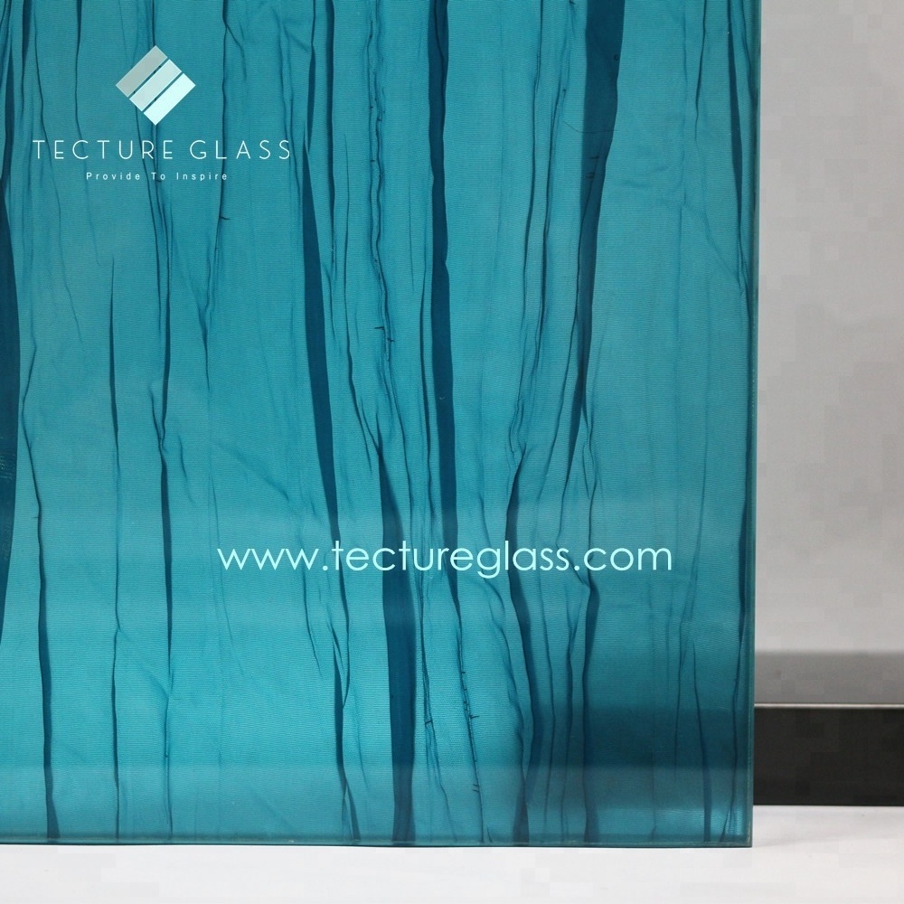 Tecture low iron laminated glass with blue textile between two glass panels