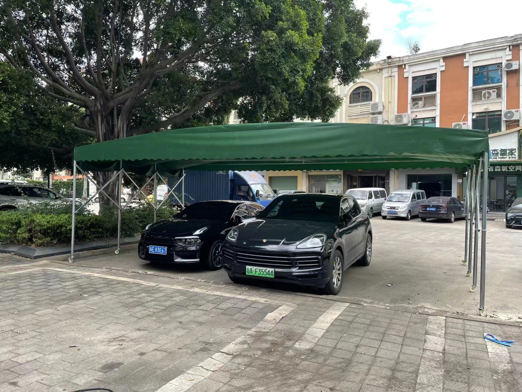 new design folding portable waterproof winter outdoor car sun shade canopy tent and parking lot cover shades tents for sale