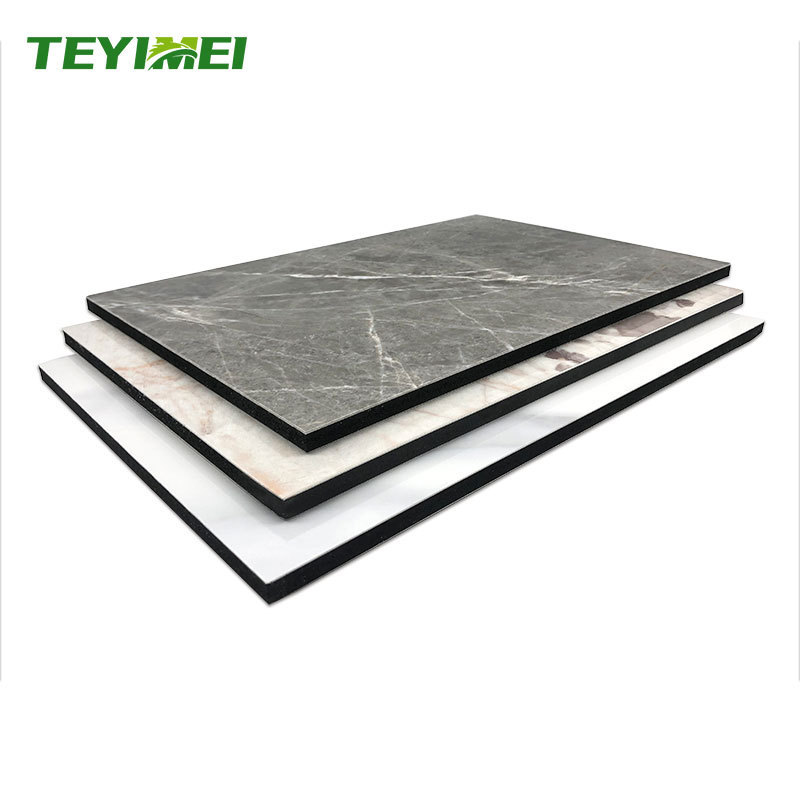 China Wholesale Carbon Pvc 4mm 8mm Wood Wall Cladding Tv Background  Marble Color Wall Panel Tile