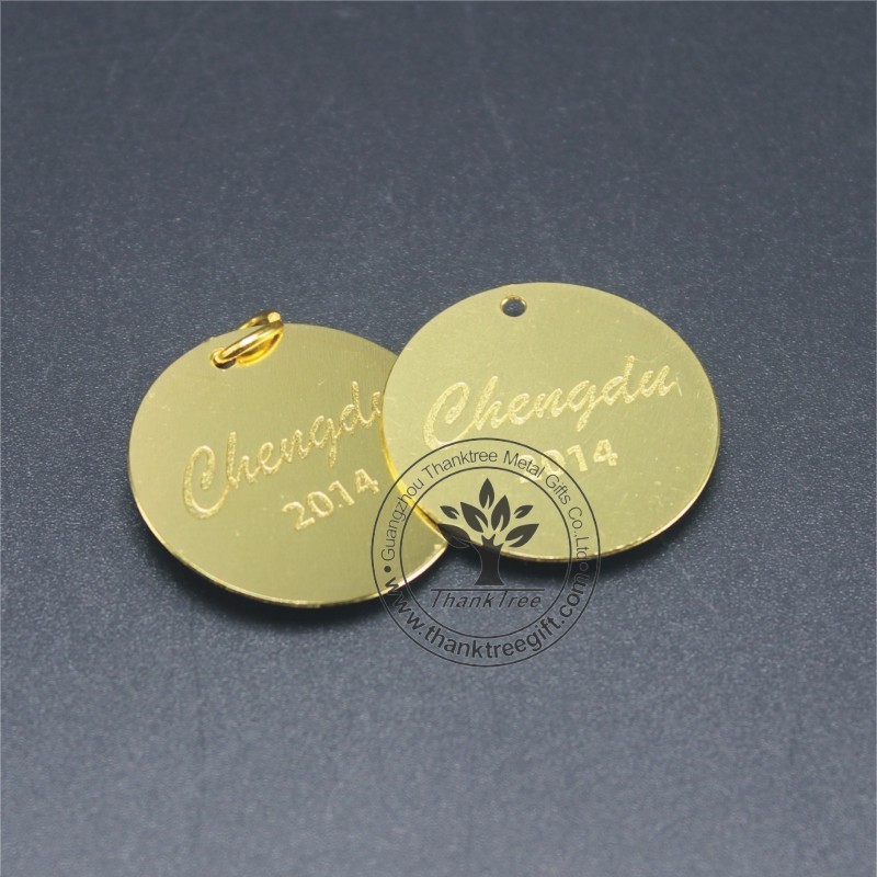 Metal material and etching technique round shape metal logo tag with engraved letters