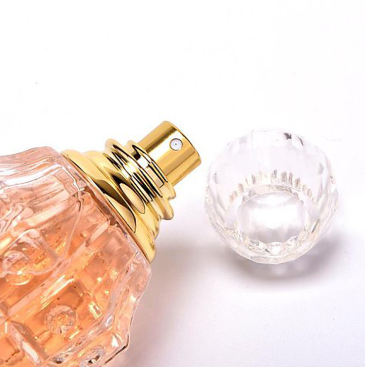 Factory price custom deluxe design grenade shape glass perfume bottle with gold cap