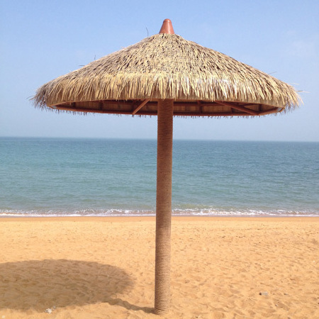 Synthetic palm leaf roof thatch beach umbrella