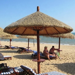 Synthetic palm leaf roof thatch beach umbrella