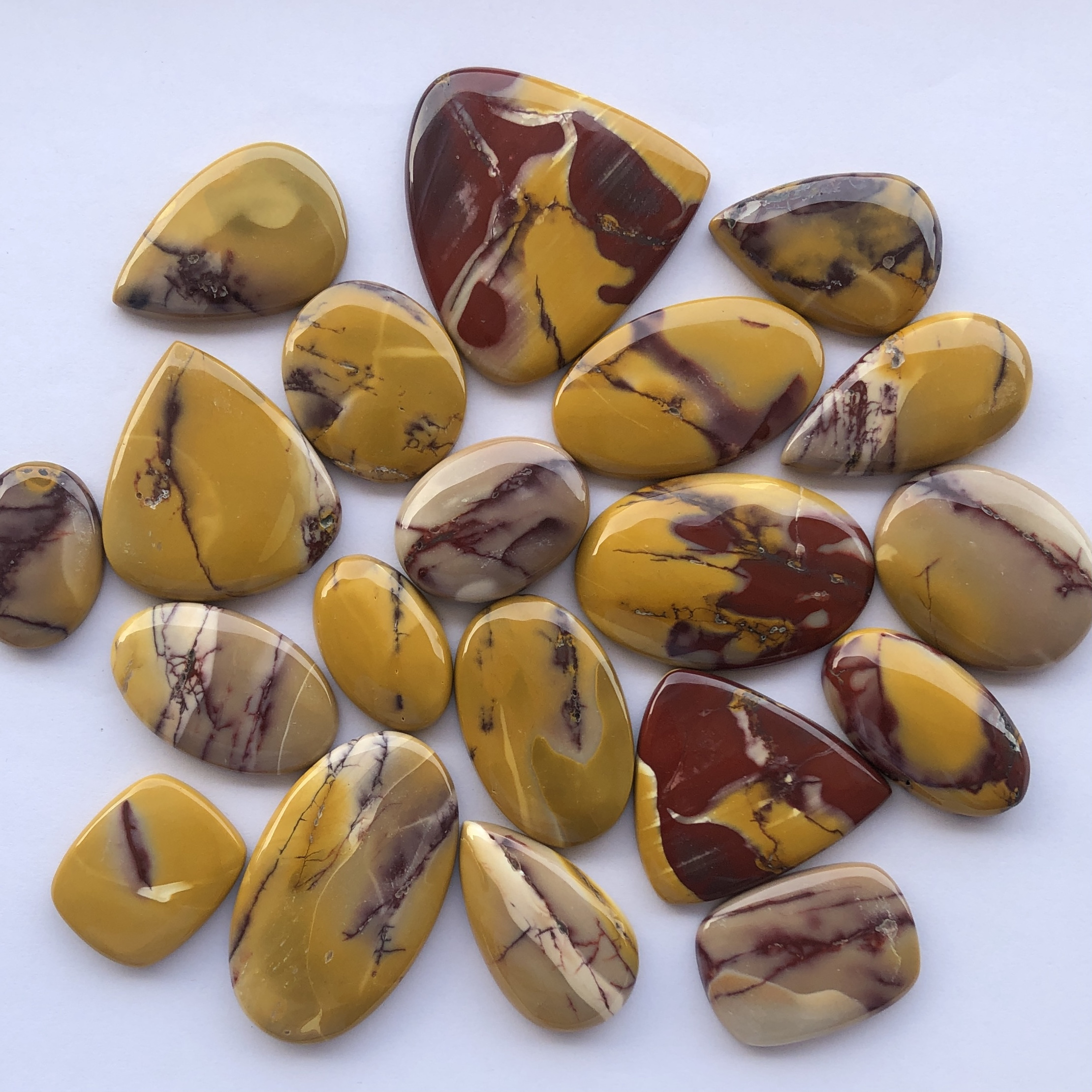 Natural Yellow Red Mookaite Jasper Stones Smooth Loose Cabochon at Factory Price from Wholesale Gemstones Supplier Alibaba India