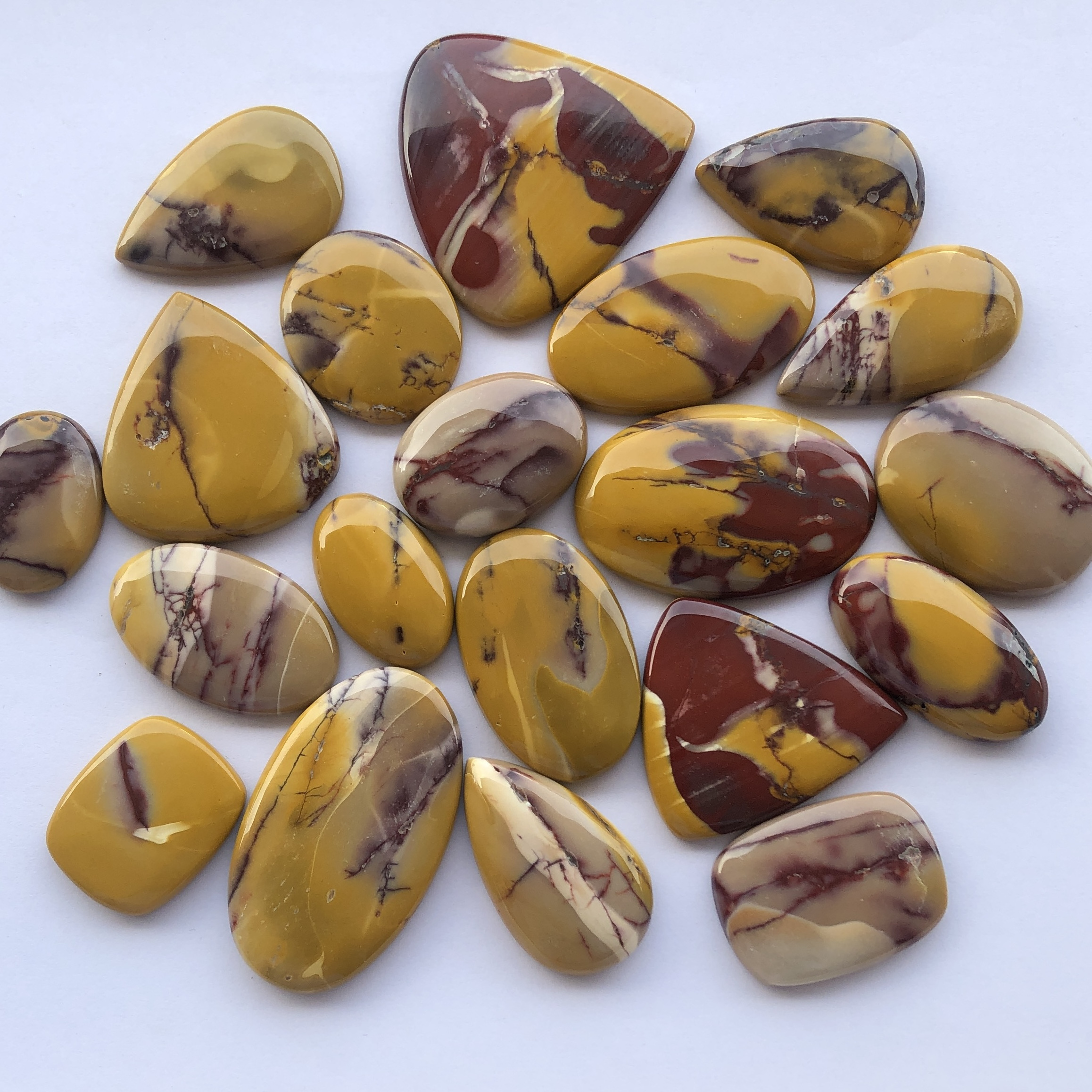 Natural Yellow Red Mookaite Jasper Stones Smooth Loose Cabochon at Factory Price from Wholesale Gemstones Supplier Alibaba India