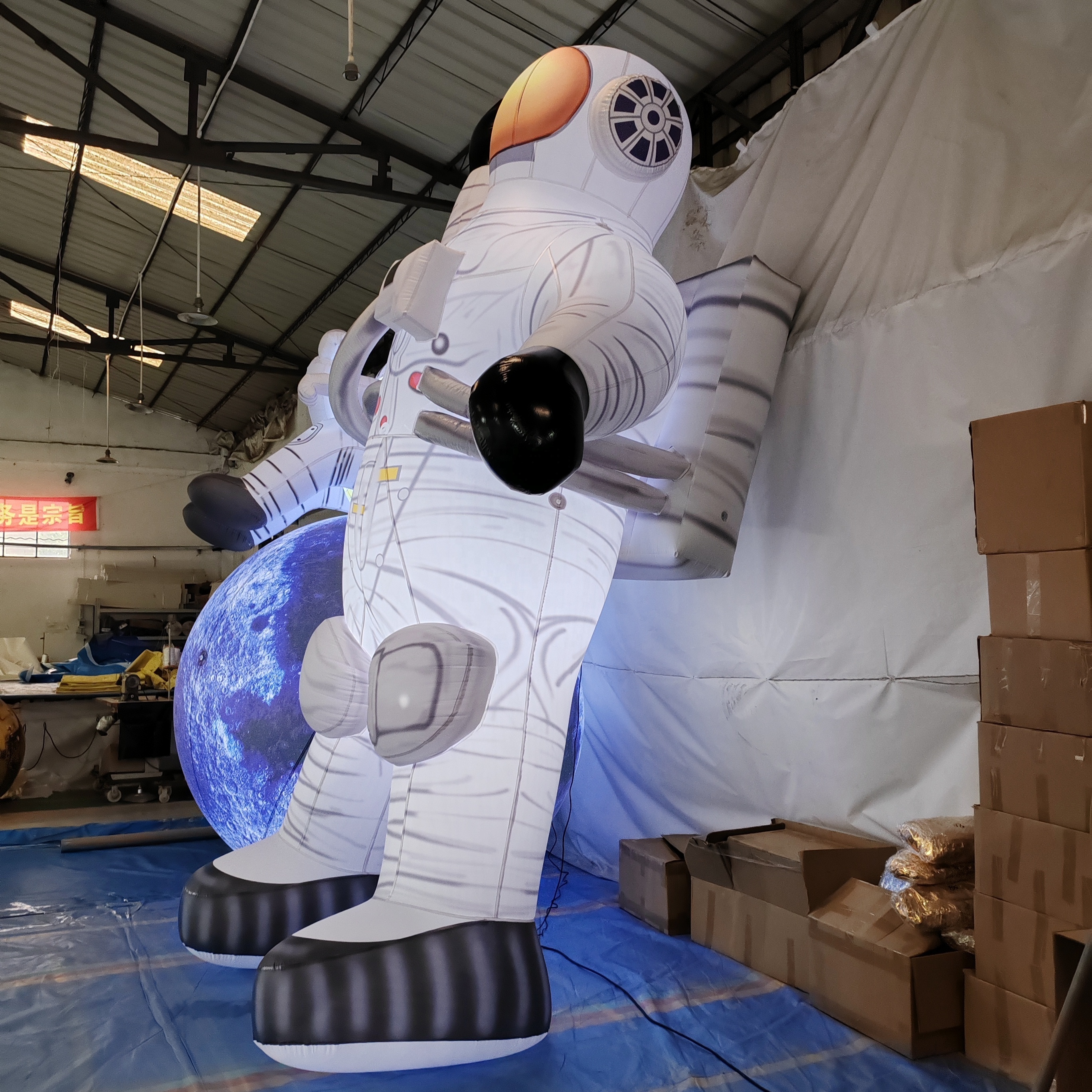 Custom inflatable astronaut with planet model outdoor decor with LED lights