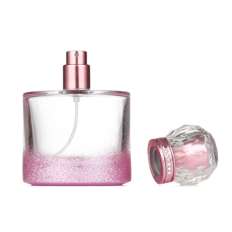 Wholesale 50ml 80ml 100ml Cosmetic Pink Cylindrical Empty Refillable Clear Glass Perfume Bottle With Pump