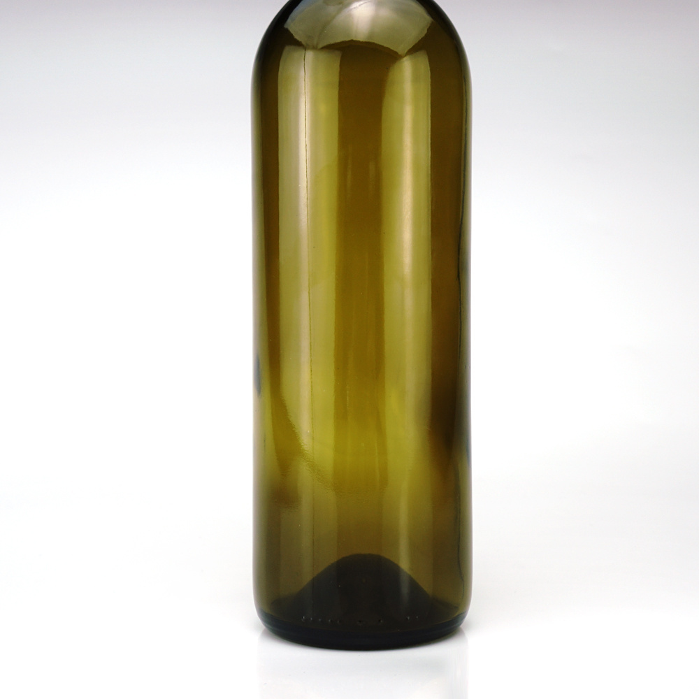 wholesale 750ml prime color bottle green color round shape glass bottle for red wine spirits