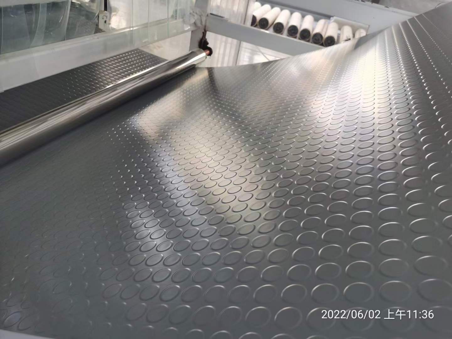 Studded rubber flooring tiles and rolls for garage / elevator / walkway