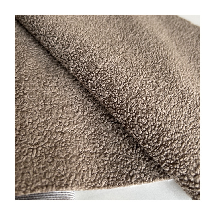 Chinese factory Cheap Teddy fleece 100% polyester warp knitted velvet fabric for sofa home textile faux lamb wool fabric