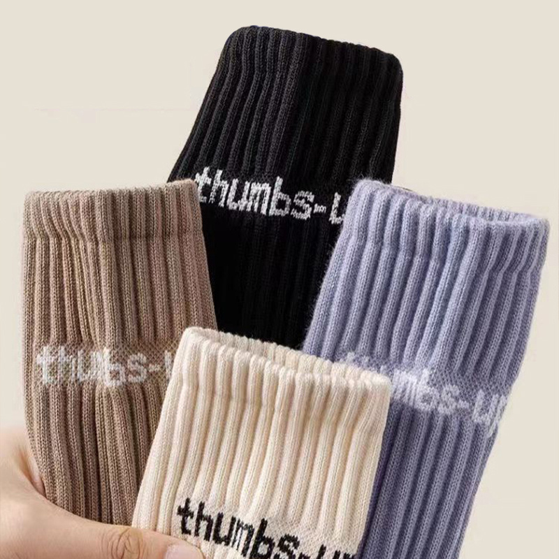 Autumn and winter women middle tube solid color sports couple socks ins trendy letter pile piles socks