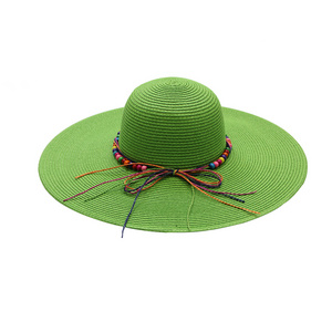 Fashion UPF50  Summer Beach Sun Hat Custom Logo  Paper rope wood bead decoration Wide Brim Braid Floppy Straw Hats for Women