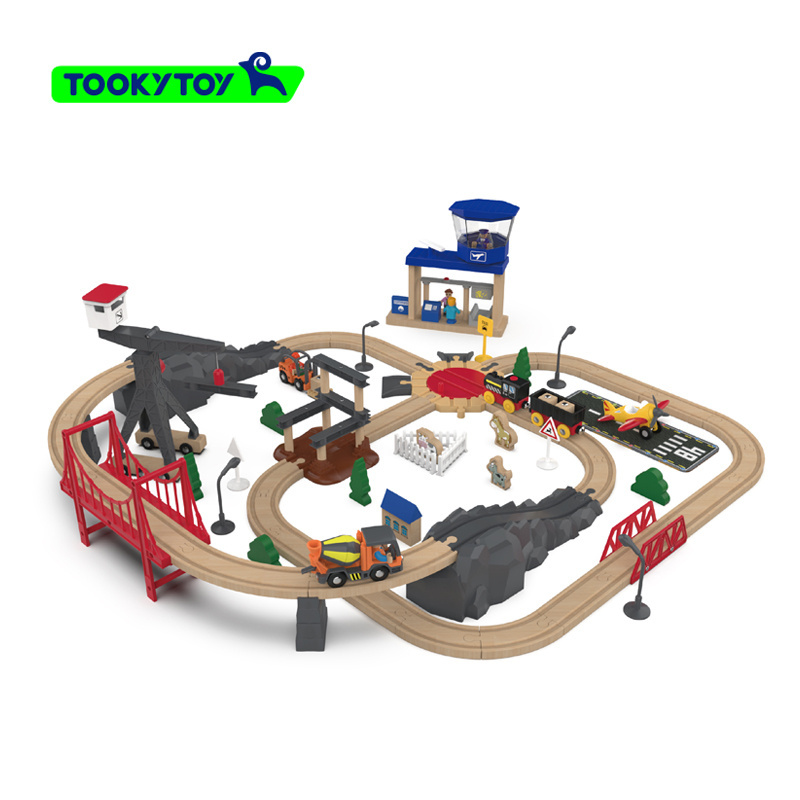 Wooden train track toy for children, including a high-speed rail toy with tracks and a set of city construction accessories.