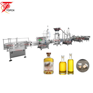 TOPCN Automatic Desktop Oil Whisky Liquor Bottle Liquid Soap Jar Filling Capping And Labeling Machine Line For Round Bottles