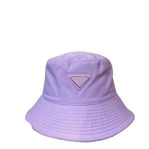 Wholesale comfort solid color bucket hat custom adjustable fisherman hat metal classic inverted triangle logo badge unisex hat