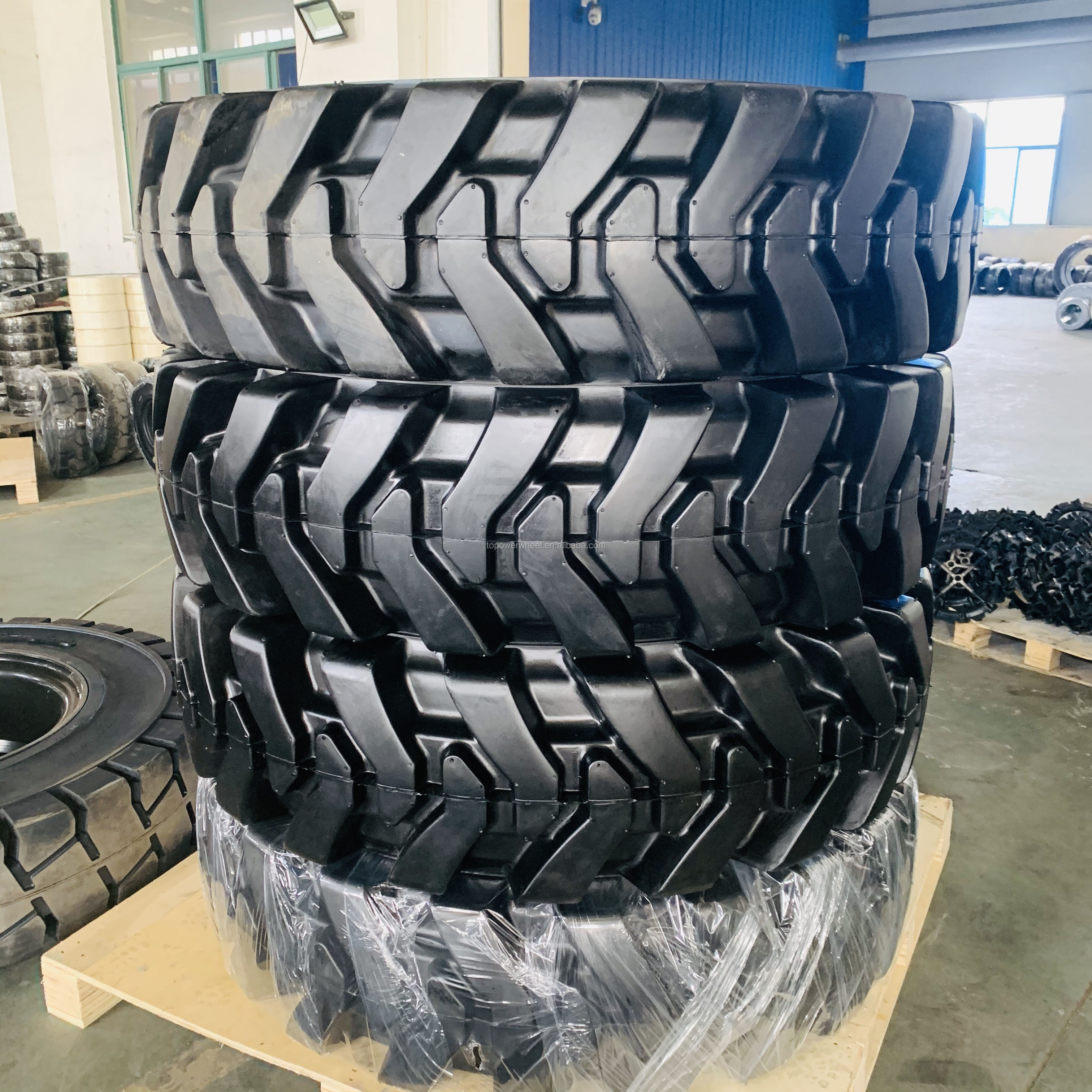 1400X24 TELEHANDLER SOLID TIRE AND RIM 14.00-24