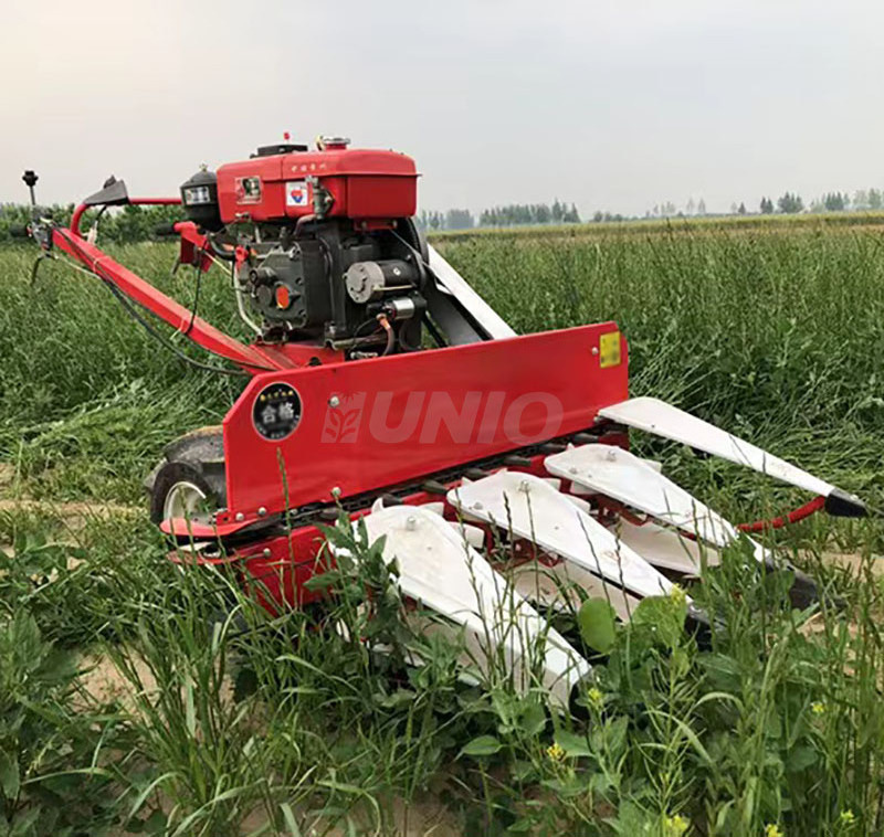 Handheld mini wheat and rice harvester Mini Rice Paddy Swather for Sale Mini Combine Harvester