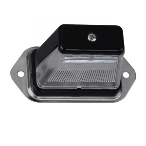 LED license plate light with plastic bracket