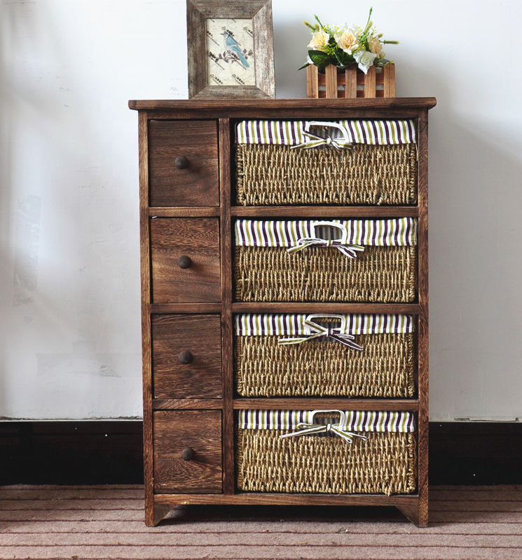 4 tier Tall wood cabinet with many drawers with rattan basket