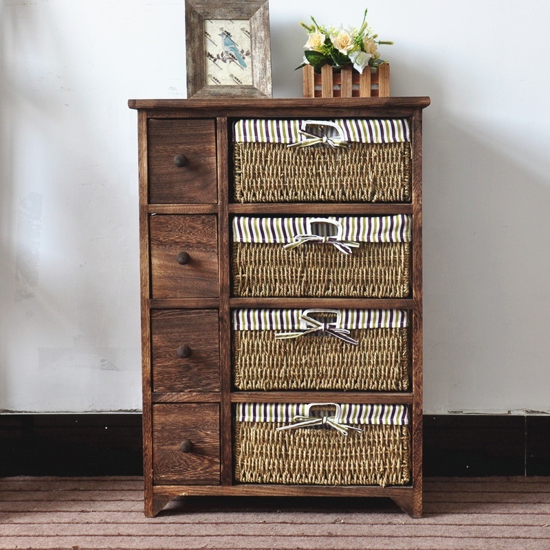 4 tier Tall wood cabinet with many drawers with rattan basket