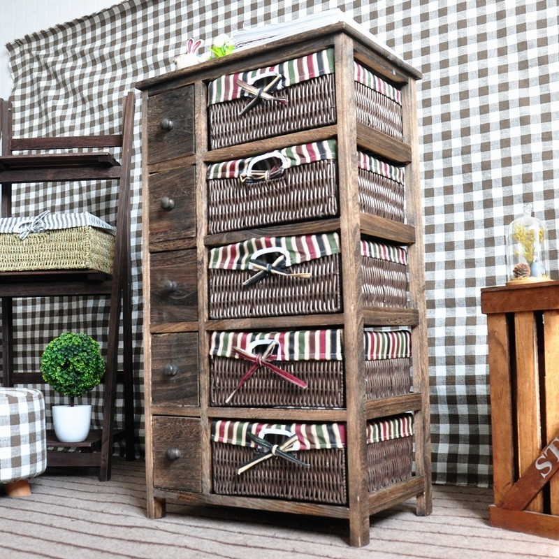 4 tier Tall wood cabinet with many drawers with rattan basket