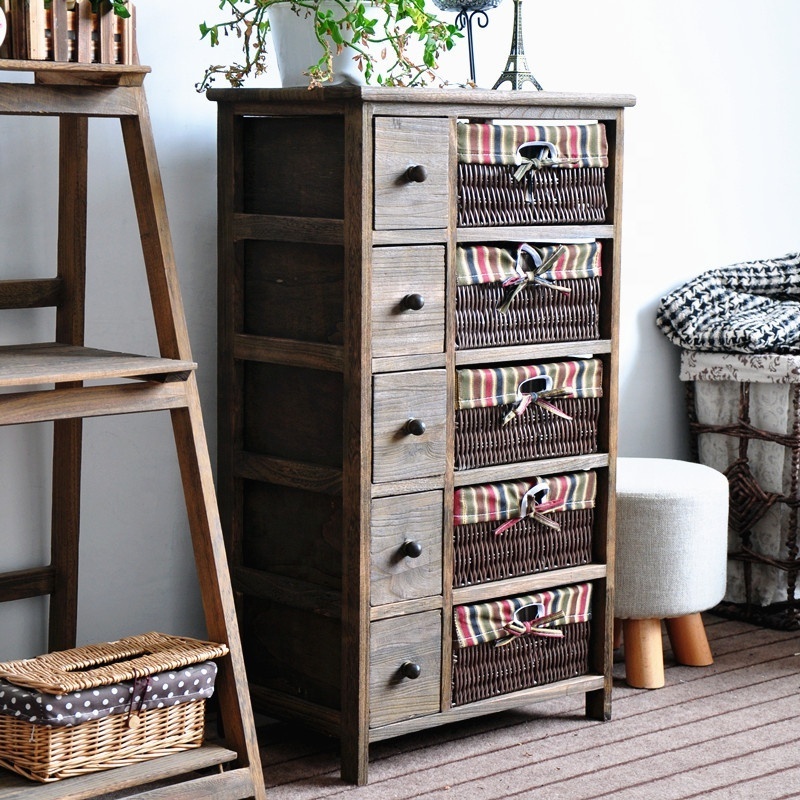 4 tier Tall wood cabinet with many drawers with rattan basket