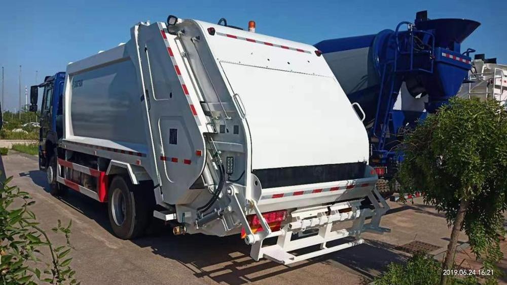 Sinotruk howo brand new 10 tons compactor garbage bin truck