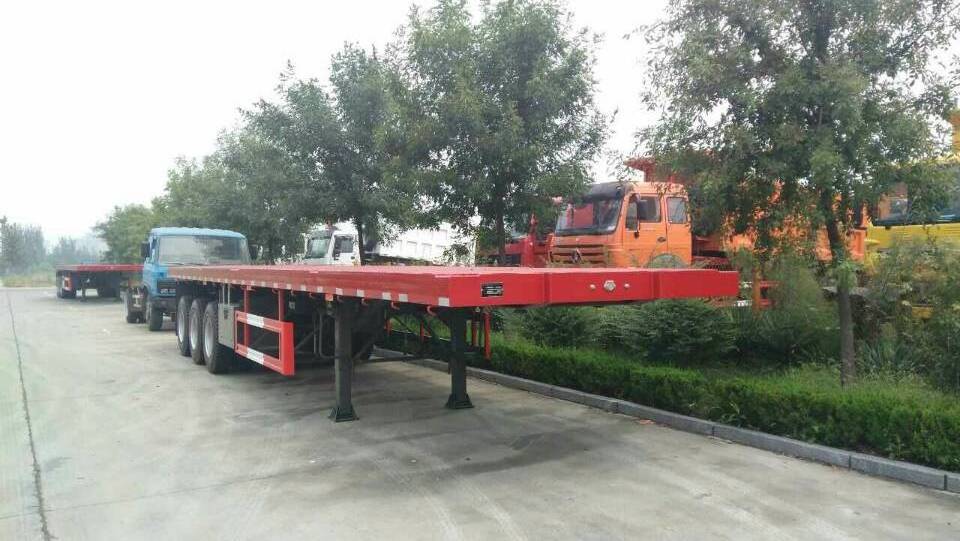 Cheap Hot Sale Tri-axle Forty Foot Trailers 60 Tons 40 Foot Good Quality Container Chassis Flatbed Semi Trucks Trailer