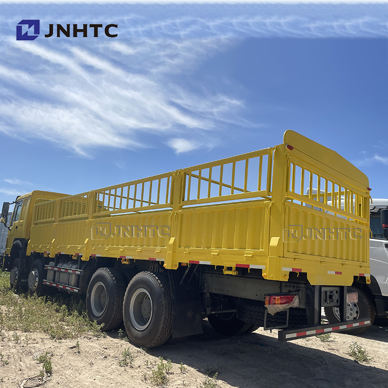 sinotruk howo 8*4 fence cargo truck new howo 12 wheeler dropside cargo truck price with tarpaulin