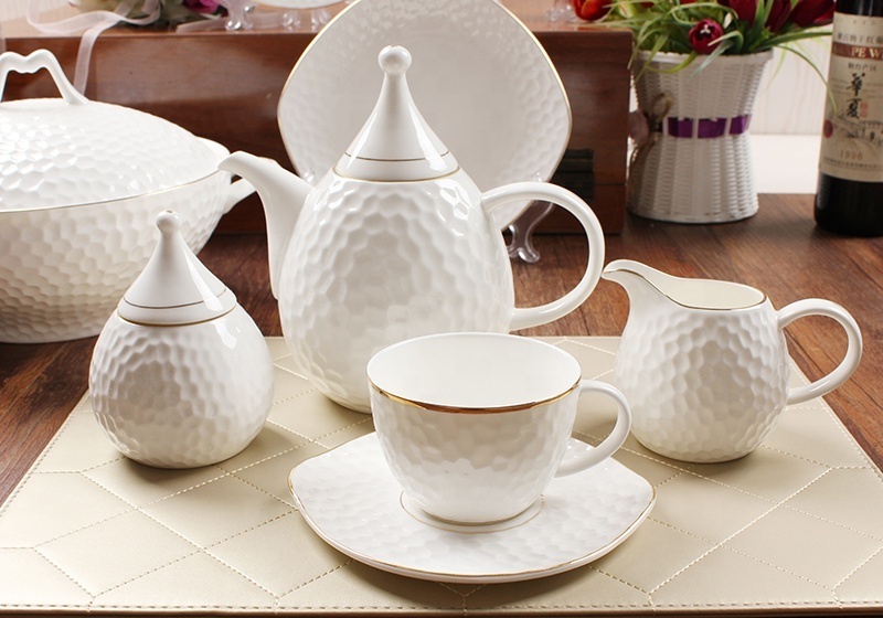 Luxury glazed ceramic dubai wholesale market embossed dinnerware sets ceramic 61 piece fine bone china dinner ware sets