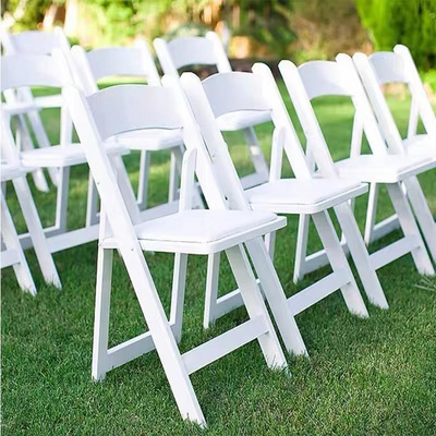 Hot Sale Wholesale Garden Wedding Party Hotel Furniture White Padded Plastic Resin  Folding Chairs For Events