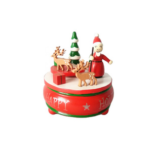 Mini wooden rotating Christmas music box with Santa Claus