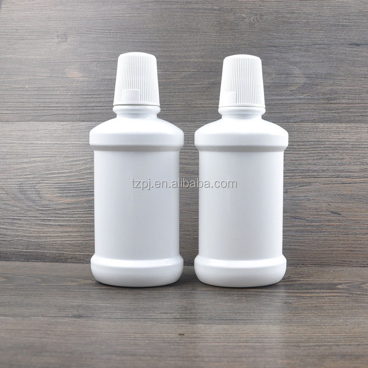 China manufacture 200ML 250ML 350ml PET white mouthwash water bottle with screw cap with measuring cup High quality