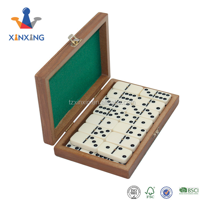 Mini Wooden domino game set with wooden box board games playing on table top