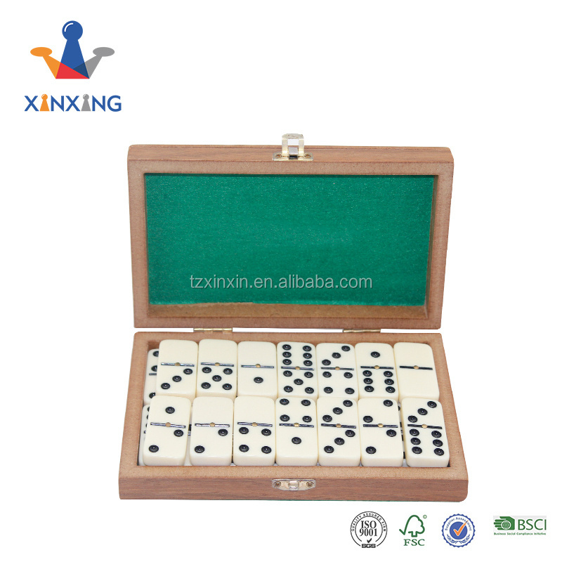 Mini Wooden domino game set with wooden box board games playing on table top