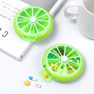 Wholesale small plastic cute 7 day round pill organizer case portable  mini medicine box colorful rotatable pill boxes travel