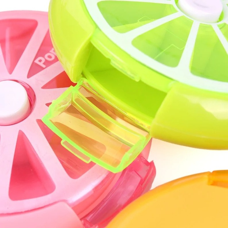 Wholesale small plastic cute 7 day round pill organizer case portable  mini medicine box colorful rotatable pill boxes travel