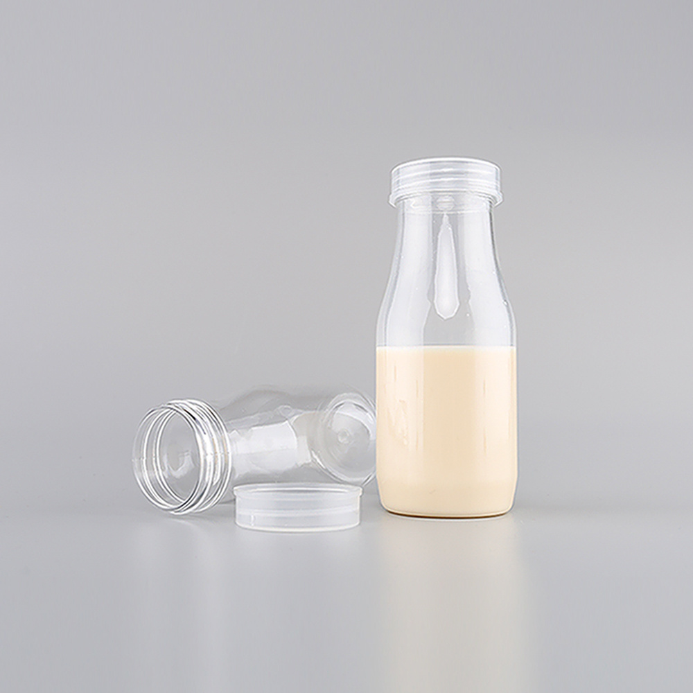 China yiwu wholesale juice milk soda packaging drink plastic jar empty water bottle 100ml  200ml 300ml