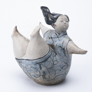 Wholesale Happy Girl in Blue Ceramic Sculpture New Design Vintage Figurines Ceramic Decoration for Hotel