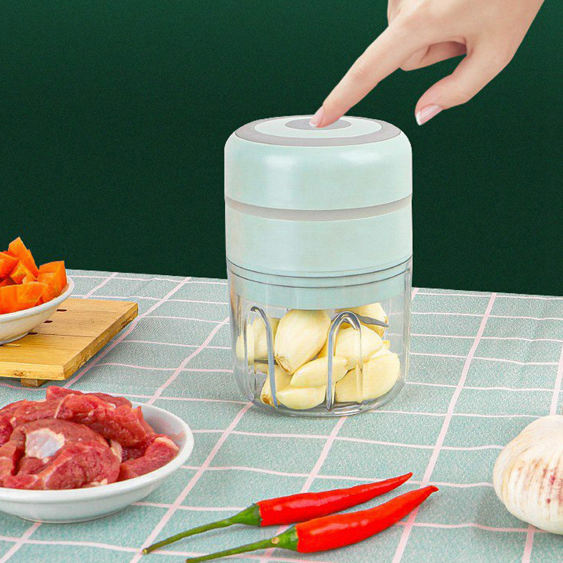 Kingwise kitchen accessories smart electric garlic press crusher grinder cracker chopper garlic press with storage container