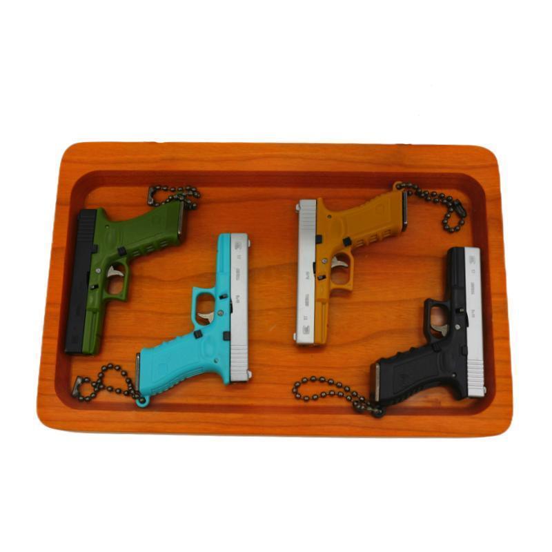 Wholesale Customized Half Alloy Key Chain 3d Glock Toy Keychain Pistol Weapons Toy Gun 1911 Mini Squirt Guns