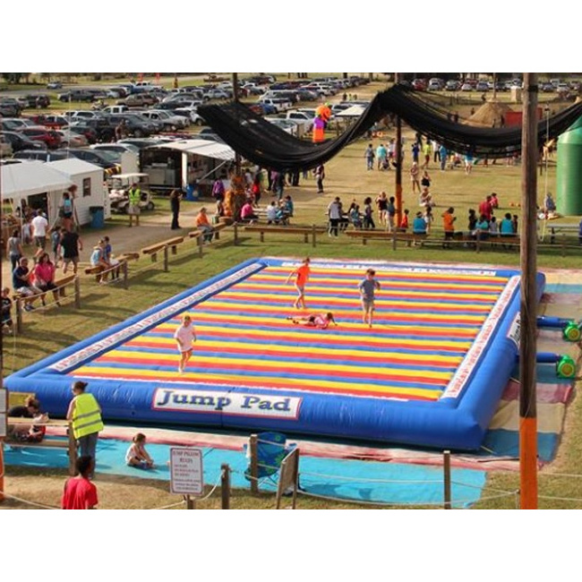 Outdoor kids n adults giant inflatable jumping pad made of 0.55mm pvc tarpaulin from China jumping pillow factory