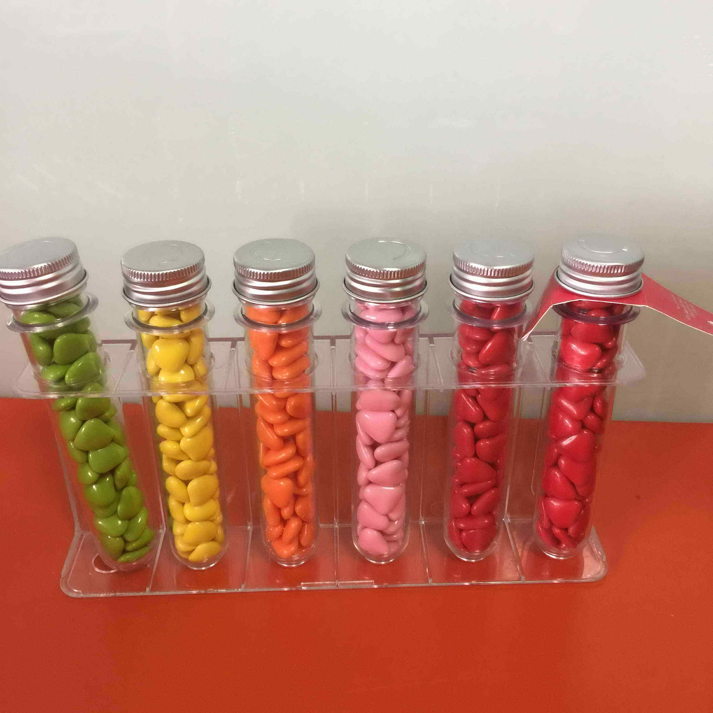 clear candy tube plastic tube packaging plastic tube with silver metal screw caps