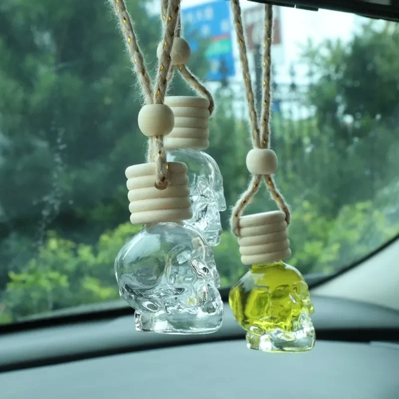 Aroma Diffuser 5ml 8ml Skull Shape fragrance bottle diffuser glass car air freshener hanging perfume bottle with wooden