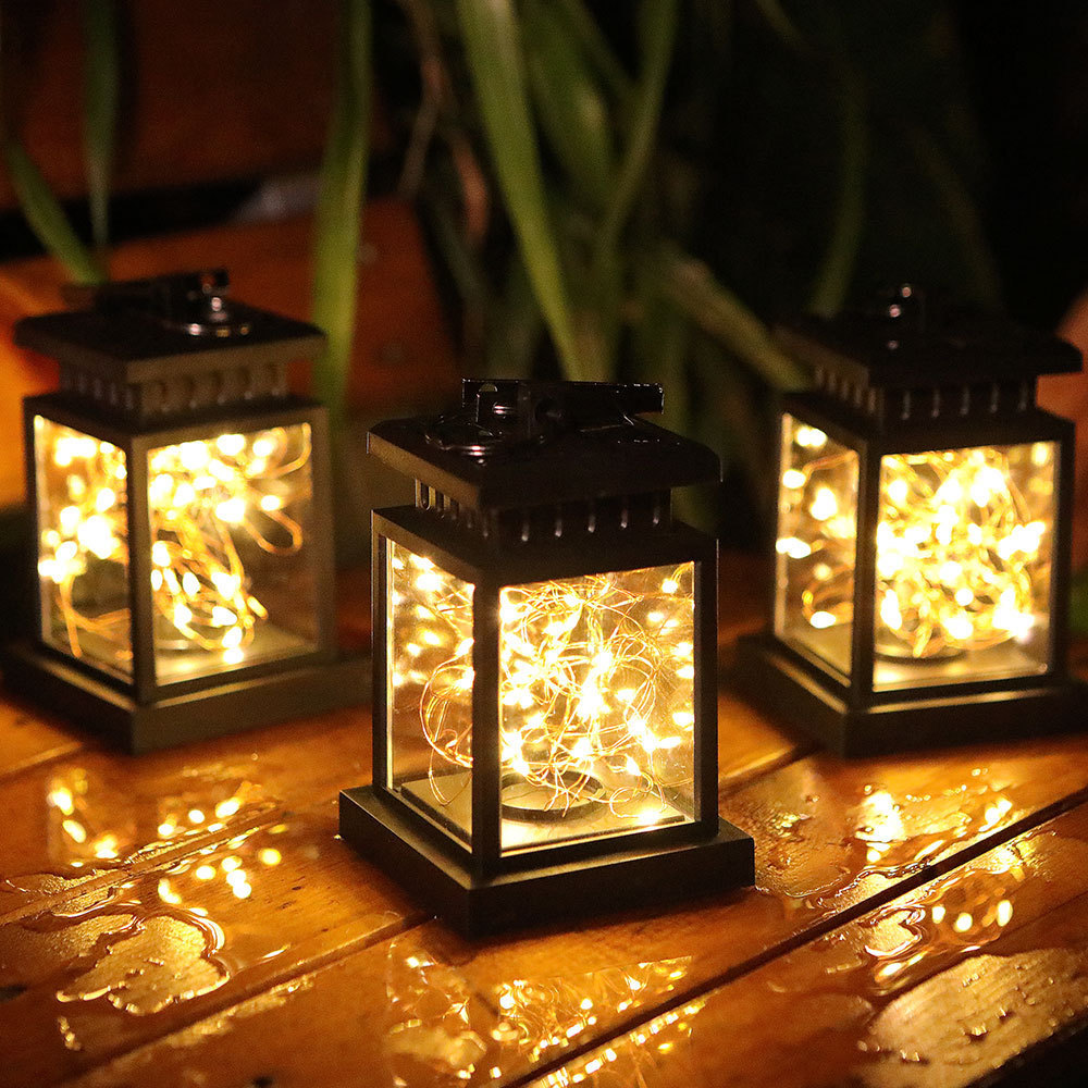 New outdoor waterproof garden lantern lantern handling small hanging light solar palace lantern garden candlelight decoration