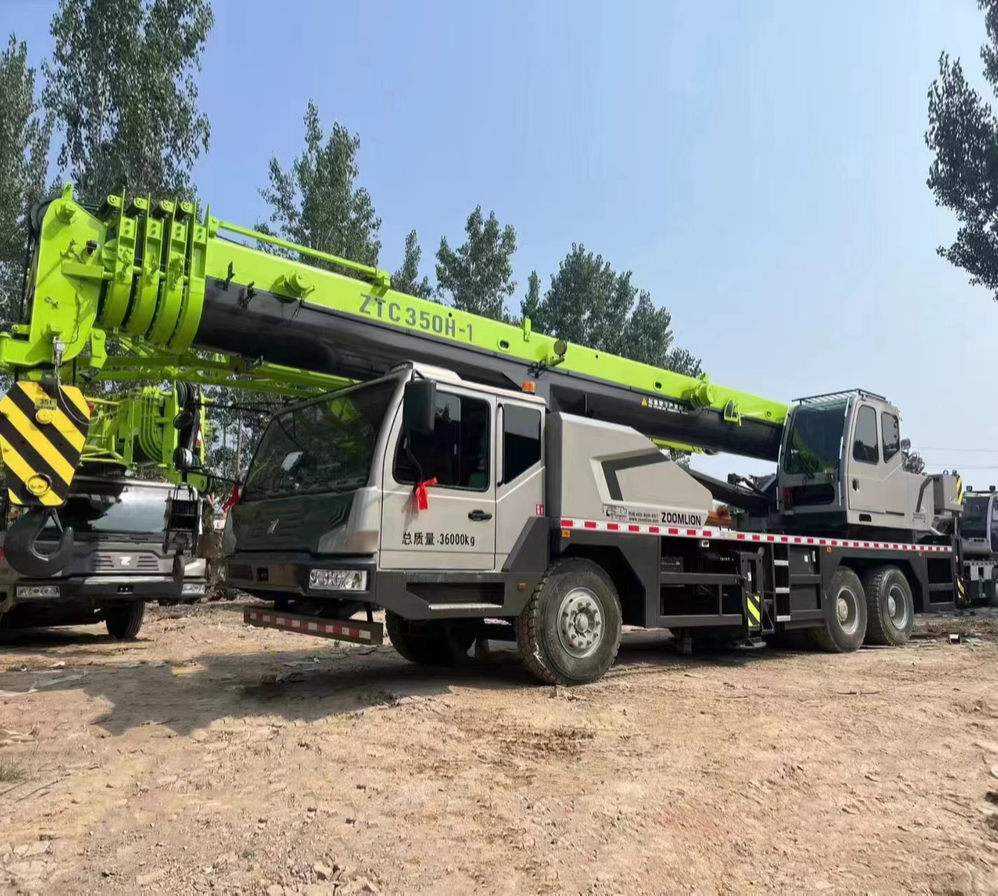 zoomlion 25ton 30 ton 35ton cmg 4x2 chinese zoomlion japan original tadano 25 ton used truck crane