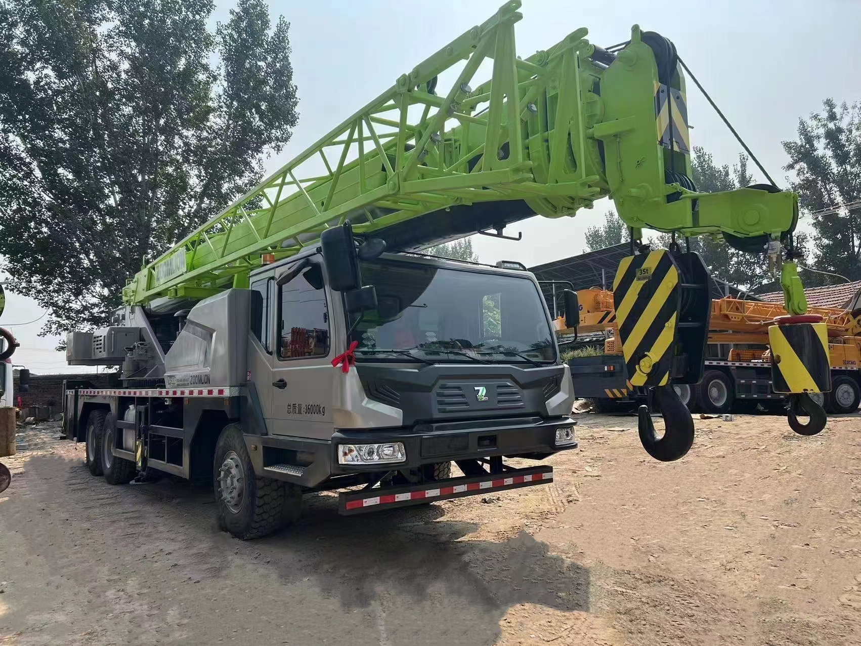 zoomlion 25ton 30 ton 35ton cmg 4x2 chinese zoomlion japan original tadano 25 ton used truck crane